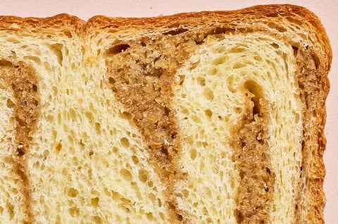 A close-up of the interior of Swirled Maple Milk Bread - select to zoom