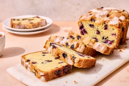Blueberry Bread sliced on a cutting board