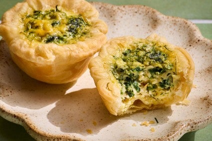 Close up of Mini Quiche to show the interior and flaky crust